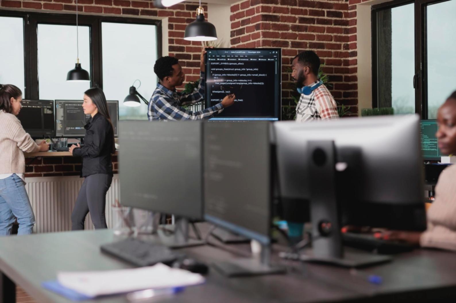 Modern AI development workspace with multiple screens showing code and neural network visualizations