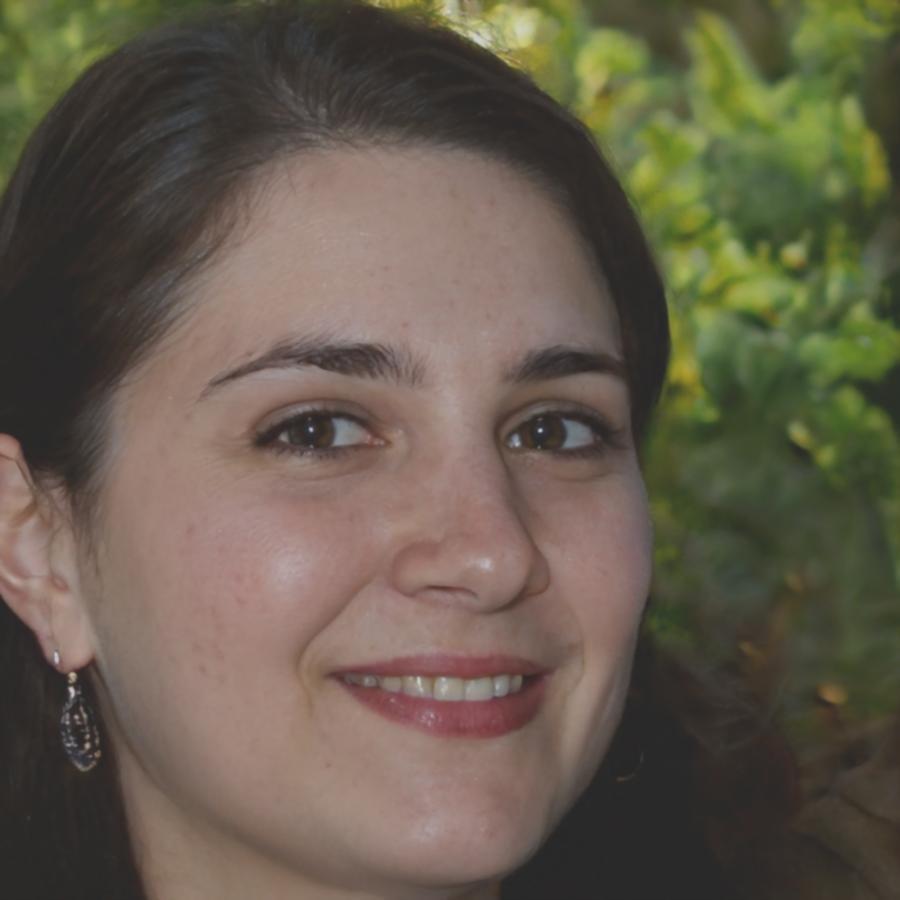 Software engineer Elena Varga working collaboratively on deep learning projects